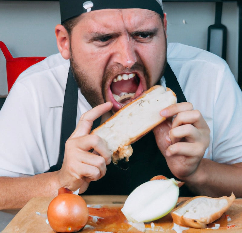 Chef cutting onions crying with bread in his mouth hack