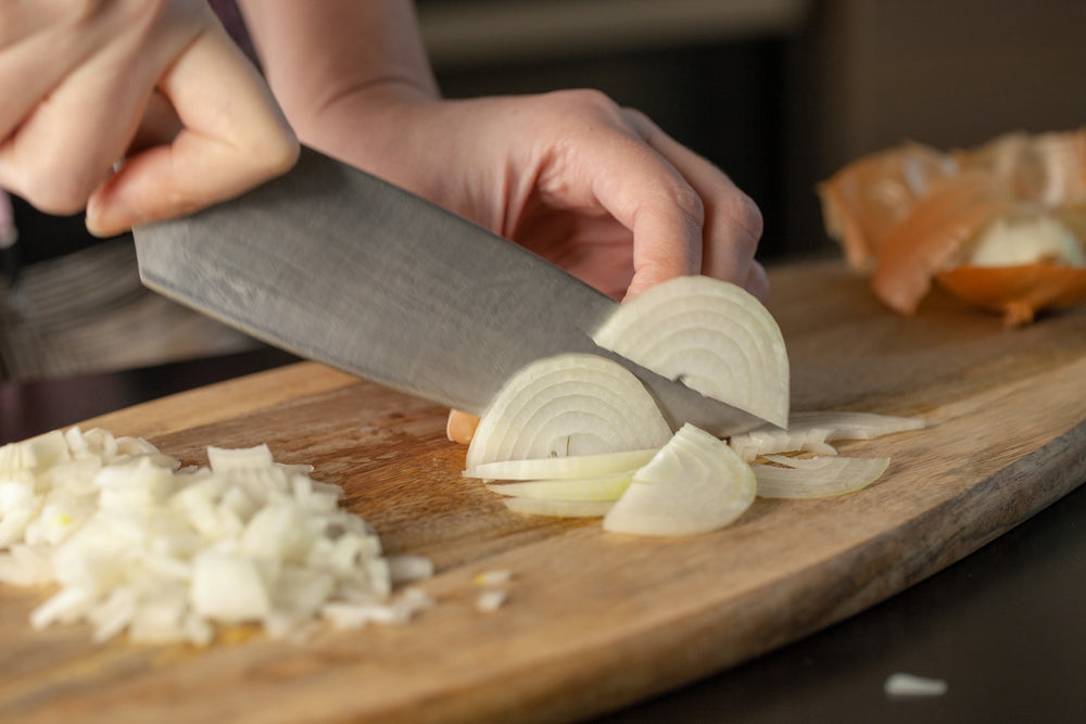 Slicing onions with a sharp knife