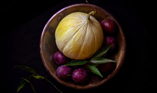 Fruit Bowl with Melon and plums